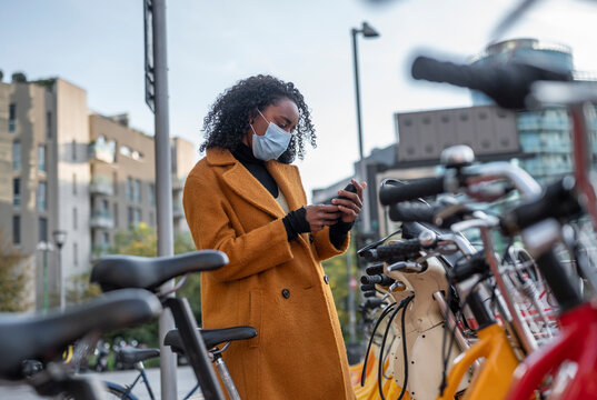 Woman using an electric scooter in the city