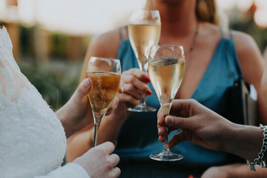 female friends enjoying and celebrating with champagne