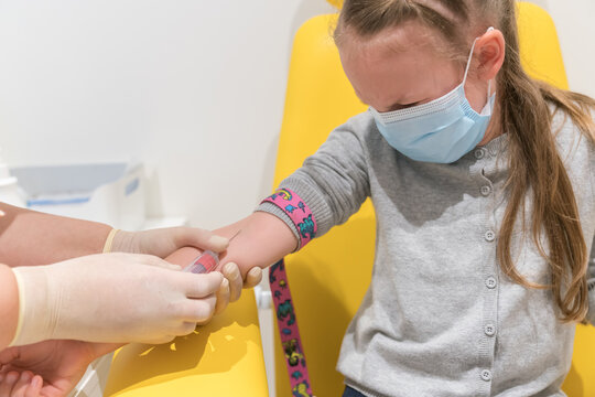 Girl Cries While Nurse Do Blood Test
