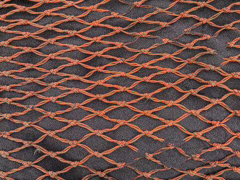 Red Nets Resting On The Sand