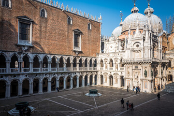 Fototapeta na wymiar Doge's Palace or Palazzo Ducale, Venice, Italy. It is one of the top landmarks of Venice. Ornate courtyard of the old Doge's Palace in the Venice center.