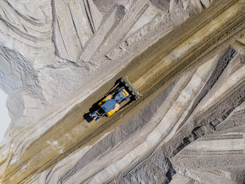 Aerial view of a bulldozer in a quarry