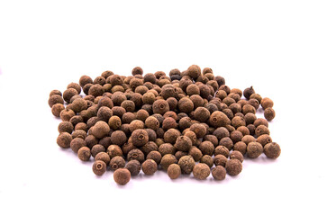 Pile of allspice isolated on white background.