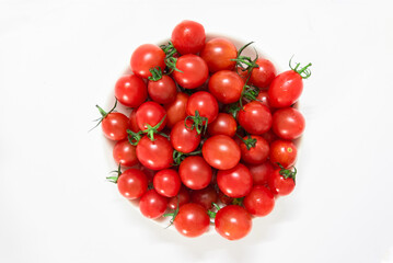 Cherry tomatoes isolated on white background