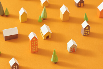 Seamless pattern of miniature town with tree and building