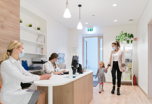 Mother And Daughter Come To Pediatric Clinic
