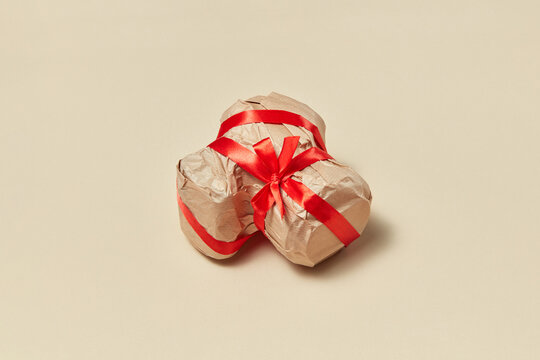 Creative gift digital camera wrapped of craft paper.