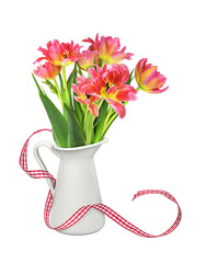 Yellow and orange tulip flowers in a white jar and satin checkered ribbon isolated on white