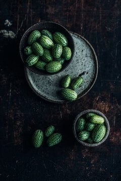 Tiny cucamelons in bowls