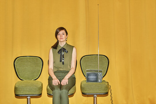 portrait of a girl with a vintage TV