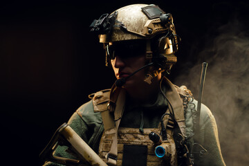 Special forces soldier with rifle on black background