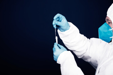 Doctor with laboratory COVID-19 test kit for diagnosis coronavirus infection.