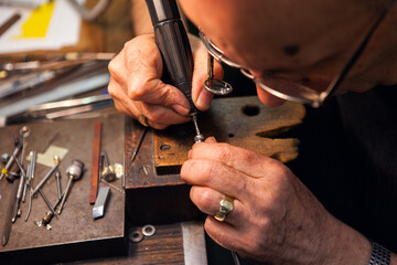 A small piece of jewellery is being hand made