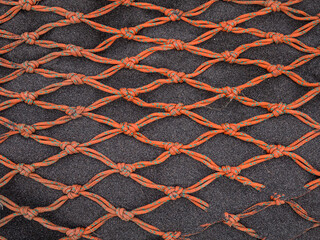 Red Nets Resting On The Sand