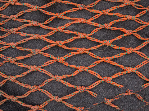 Red Nets Resting On The Sand