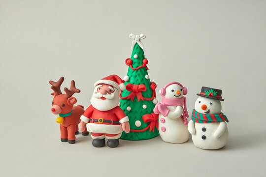 Plasticine figures of traditional Christmas characters. - Powered by Adobe