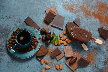 Chocolate flavor popsicle, almonds, coffee beans, and tasty chocolate pieces .