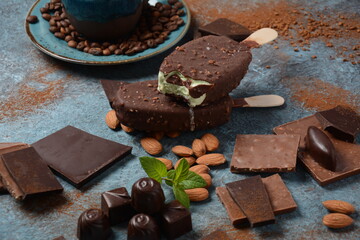 Chocolate flavor popsicle, almonds, coffee beans, and tasty chocolate pieces .