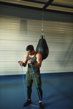 Pugilist developing definition of muscles