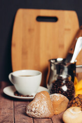 cookies on the kitchen table a cup with a drink sweets dessert