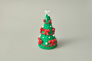 Plasticine figure of decorated Christmas tree.
