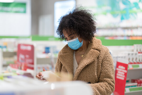 Woman With Medical Mask At Pharmacy