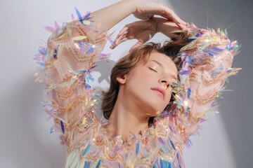 Androgynous dreamy model in fancy dress