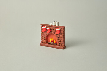 Festive decorated fireplace made from plasticine.