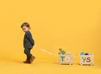 Little Boy Playing With Toys