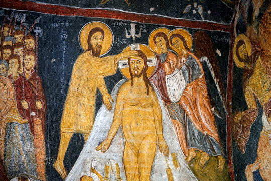 CAPPADOCIA, TURKEY Frescoes on a wall of cave church, Gulsehir - St. Jean Church (Karsi Kilise). Scene Baptism of Jesus Christ