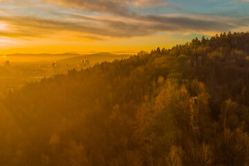 Early morning drone panorama photo of abandoned ski jump tower in Mostec, Ljubljana. Relic of an old ski jumping hill in the Slovenian city.