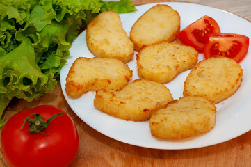 Potato pancakes from the oven with sour cream sauce