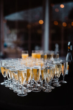 Champagne and fruit juice on a table ready to be served