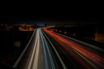 Fototapeta na wymiar Speed lights on the road with long exposure