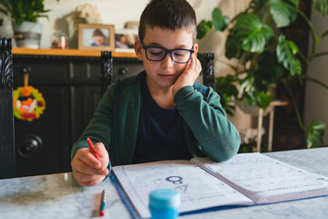 Focused Kid doing Homework