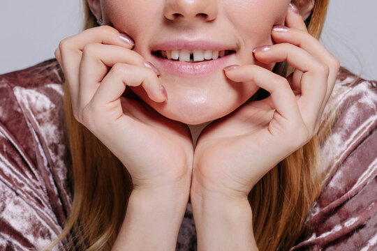 Crop unrecognizable smiling model