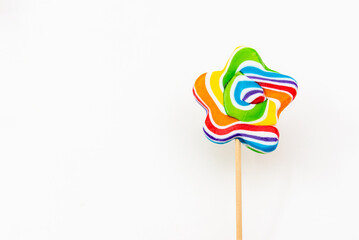 The star-shaped lollipop is isolated on a white background
