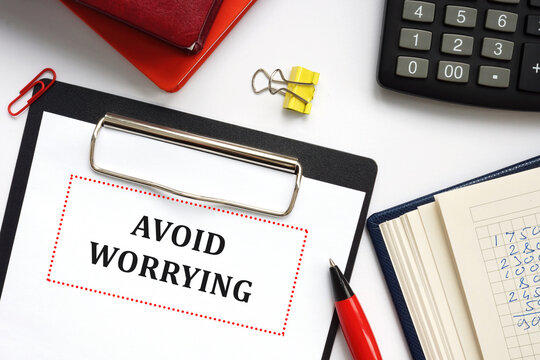 Conceptual photo about AVOID WORRYING with written phrase.