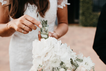 bride enjoying an appetizer on her wedding day