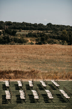 Folding chairs in rows for wedding ceremony