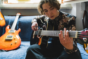 Girl Learning to Play Acoustic Bass