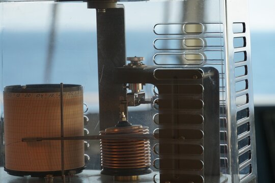 Detail and close up view on ships barograph as a part of meteorological station for weather observation.
