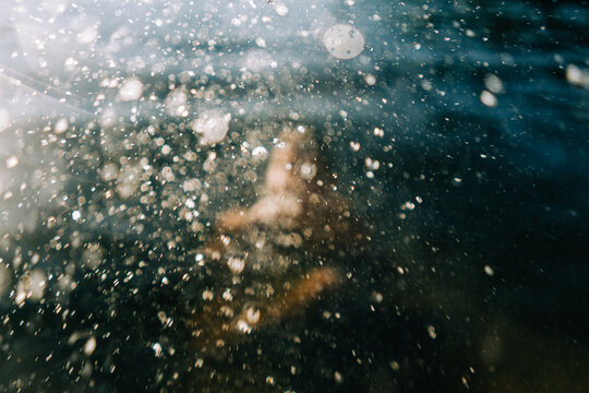 boy spitting water out