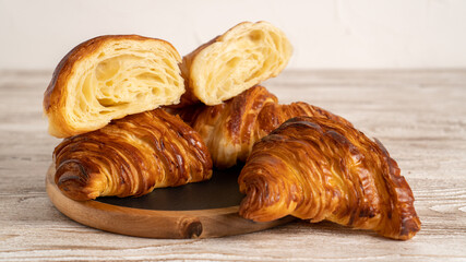 Background for french croissants. French croissants isolated. Fresh tasty croissants as background