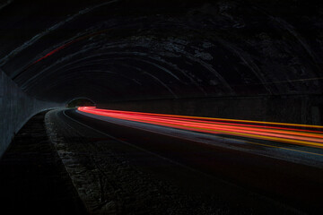 Car and truck light trails. Long exposure photo taken in a tunnel below Veliko Tarnovo