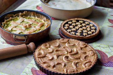 group of trays with sweet and savory preparations ready to eat