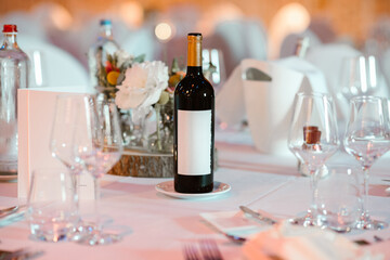 Bottle of wine on a wedding table