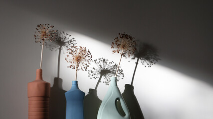 Dried allium flowers in vases