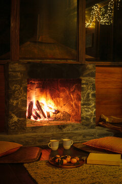 Cozy winter still life near fireplace