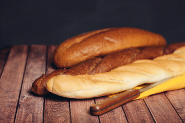 slicing a loaf on a cutting board kitchen eating breakfast fresh smell